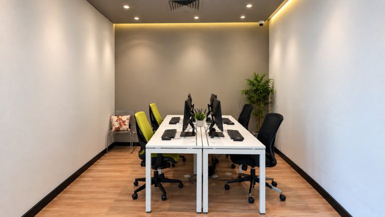 Design and sales team workstation room with cove lighting at Metroplus head office